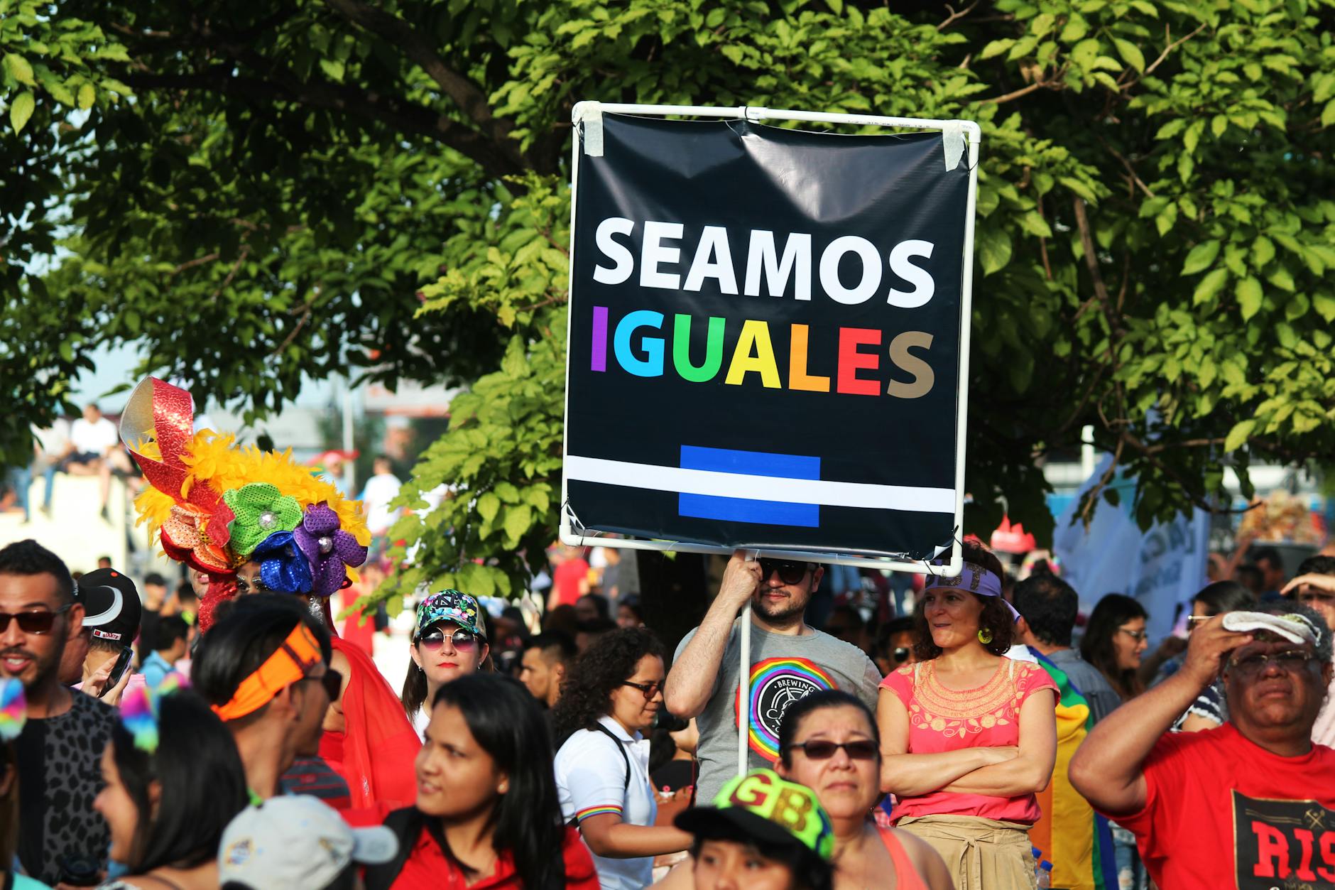 a man holding a placard