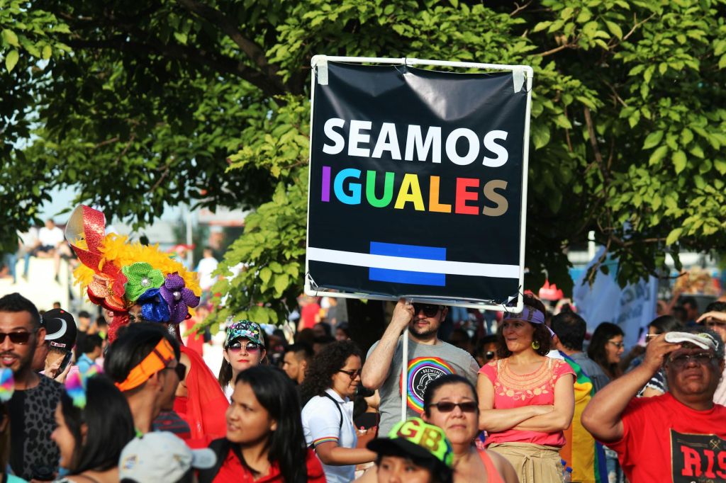 a man holding a placard