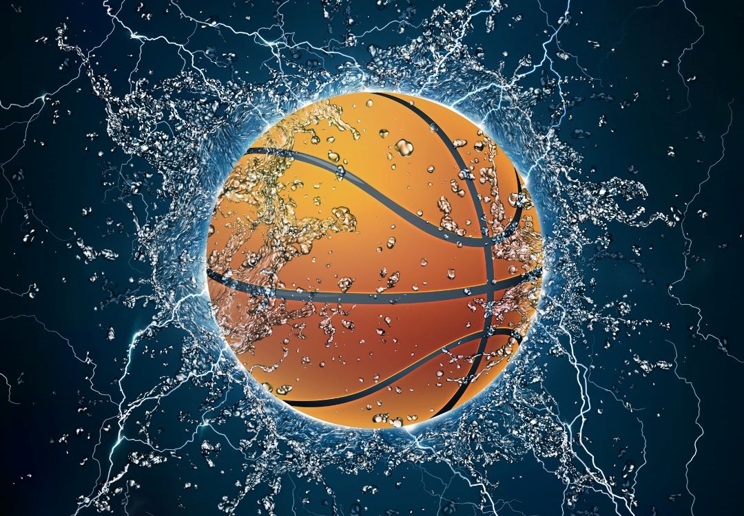 A basketball suspended in a splash of water against a dark background.
