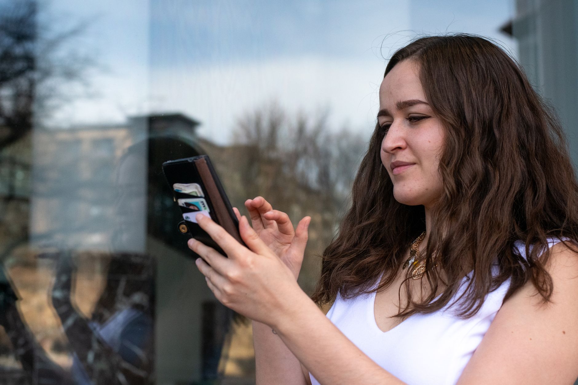 young woman using smartphone outdoors