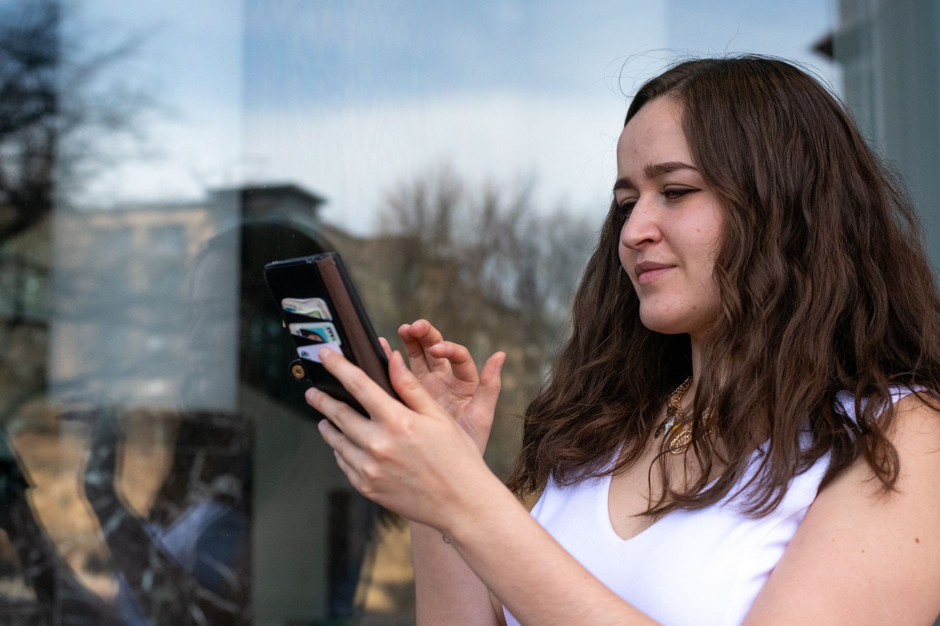young woman using smartphone outdoors